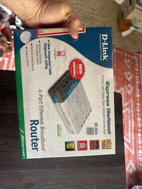 D-Link White and Blue 4-Port Ethernet Router (DI-604)